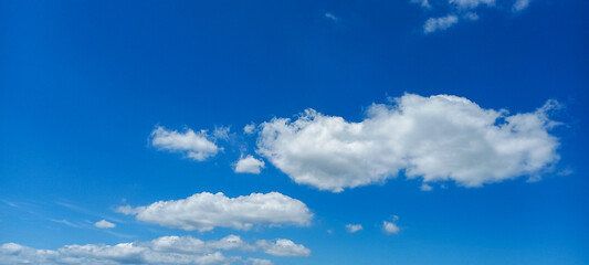white clouds with blue sky