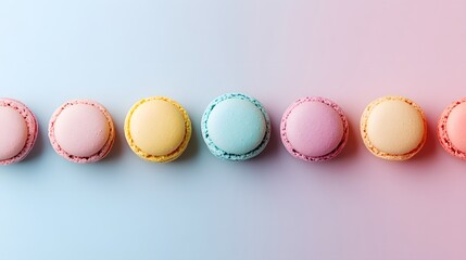 Obraz premium Brightly colored macaroons arranged in a neat row.
