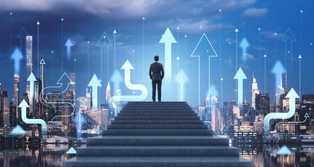 Businessman standing on stairs looking at city with upward arrow