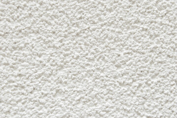 White plaster wall background, pop corn plaster pattern texture