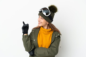 Skier caucasian woman with snowboarding glasses isolated on white background intending to realizes the solution while lifting a finger up