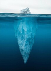 Fototapeta premium An iceberg with a small visible portion above water and a massive section submerged, representing personal development.