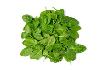 Fresh spinach leaves on a white background for healthy meal preparation and cooking