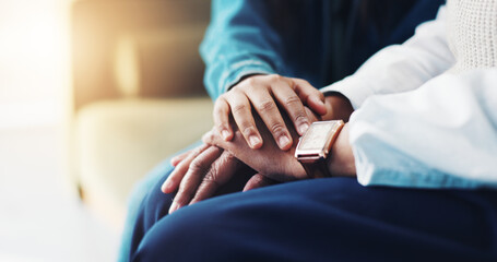 Support, child and holding hands with psychologist for care, faith or trust in clinic. Comfort,...