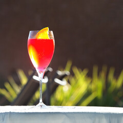 Red drink on table. Summer vacation