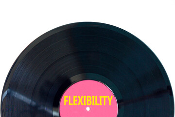 Flexibility symbol. Concept word Flexibility on beautiful black purple vinyl disk. Beautiful white...