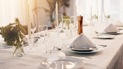 Plate, dinner and glasses on table at party for celebration, social event and gathering. Fine dining, luxury and decoration, setting and design for gala, new years eve and supper at restaurant