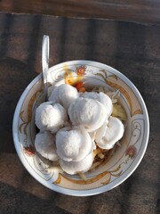 Ice Cream Dessert in a Bowl, Colorful Frozen Treat, Sweet and Creamy Delight, Refreshing Summer Snack Served in a Dish