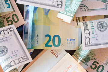 Currency Close-Up. Detailed view of mixed Euro and Dollar bills.