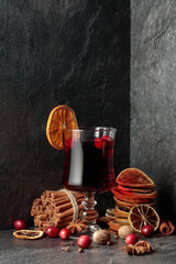 Hot Christmas drink with ingredients.