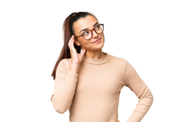 Young beauty woman over isolated chroma key background thinking an idea