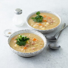Homemade pea soup with smoked meat