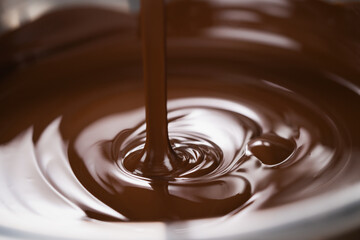 melting dark chocolate in steel bowl