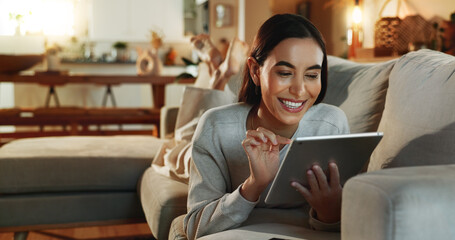 Relax, smile and tablet with woman on sofa in living room of home for online shopping at night....