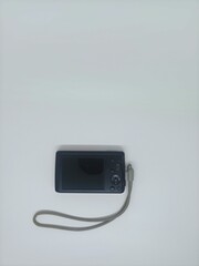 Black Digital Camera with Gray Wrist Strap on White Background