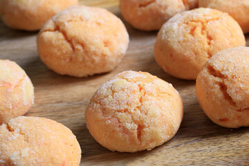 Orange Crinkles on a Wooden Surface