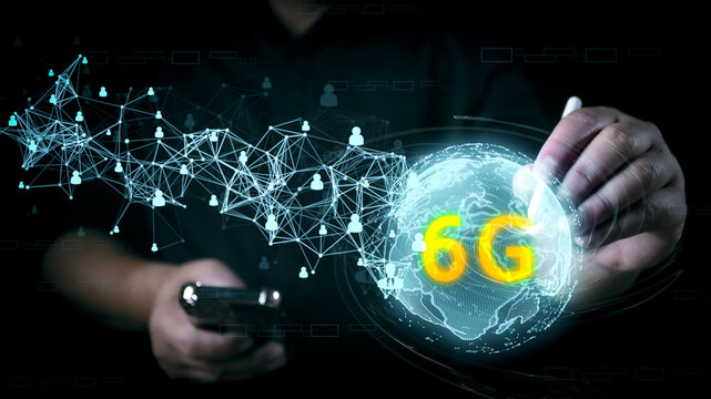 Businessman pen pointing at futuristic 6g technology and futuristic advancement, future technology 6G network internet of thinks connection communication, high-speed internet network signal.