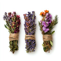 Three tied bundles of colorful herbs and flowers against a white background.