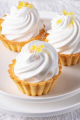 Baskets with protein cream on a white table