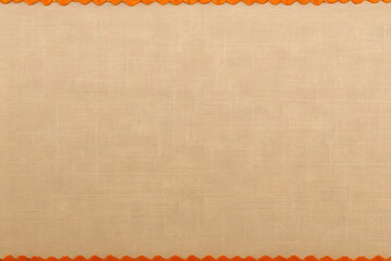 A close-up view of a beige textured fabric with a subtle woven pattern.