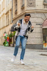 Excited happy man traveler shouting, celebrating success, winning, goal achievement, good news,...