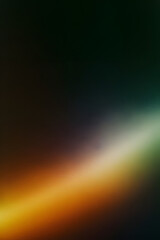 Abstract image of a colorful light spectrum on a dark background.