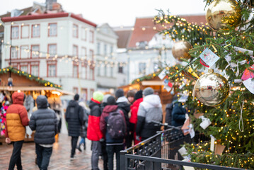 Fototapeta premium Winter Fair for the New Year and Christmas holidays, food houses in Tallinn Estonia,