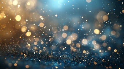 Abstract blue and gold bokeh background with glitter.