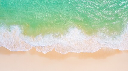 Aerial View of Tranquil Beach and Clear Ocean Waves
