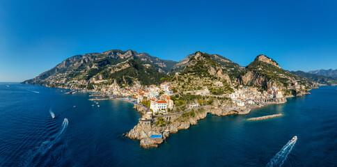 Obraz premium View of beautiful Amalfi town, Campania, Italy. Amalfi coast is most popular travel and holiday destination in Europe. Amalfi cityscape on coast line of mediterranean sea, Amalfi coast, Italy.