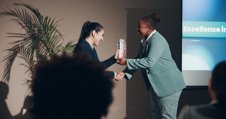 Handshake, award and smile of women, seminar and congratulations for success, event and corporate....