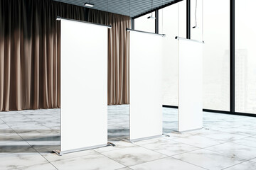 Empty roll-up banners in a modern exhibition space with curtains and large windows. 3D Rendering