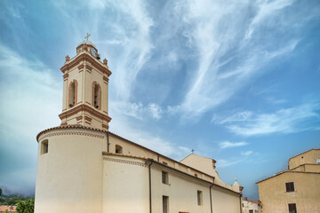 Fototapeta premium Piana village in Corsica, the church, in a typical street 