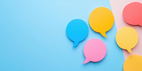Colorful speech bubbles on a pastel background, ideal for communication, conversation, or social media themes.