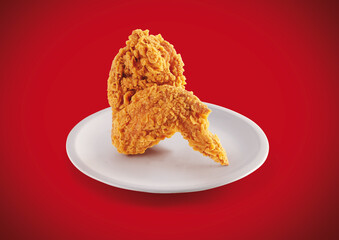 crispy fried chicken in a red background