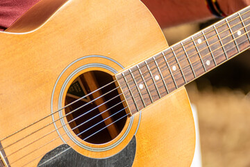 Obraz premium detail of the body of a classical spanish guitar, acoustic guitar concept