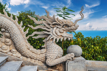 dragon statue decorates the staircase at the Linh Ung Pagoda in Da Nang in Vietnam in Asia