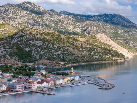 Aerial drone photo of the small coastal town and marina in Karlobag, Croatia.