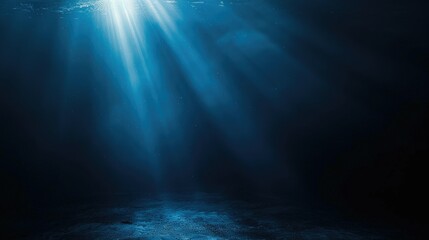 Fototapeta premium A blue gradient background with a spotlight shining down from the top left corner, creating an atmosphere of mystery and intrigue