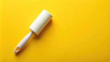 Lint roller brush for cleaning fabric residues on a yellow background, Fabric cleaner, Lint roller, Brush, Cloth