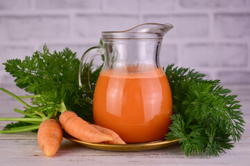 Carrot juice in a carafe. Juice rich in vitamin A.
