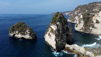 Diamond Beach, popular tourist place on Nusa Penida island. High cliffs near the coast, Indonesian...