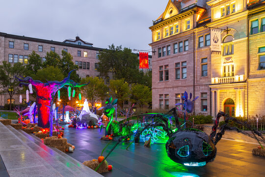 Quebec City, Quebec, Canada, October 6, 2024 -&nbsp;Giant spider and other Halloween decorations in the gardens of the late 19th Century stone chateauesque City Hall