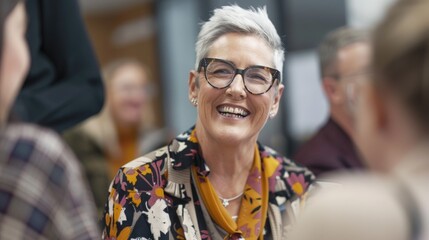Obraz premium A happy woman wearing glasses smiles at a gathering of friends or colleagues