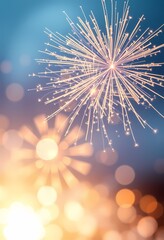 Obraz premium Golden Fireworks with Shimmering Sparks and Dreamy Bokeh in Soft Blue and White Tones