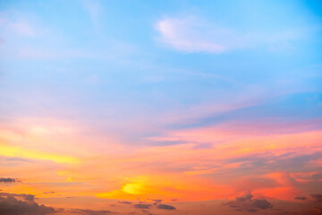 Fototapeta premium Beautiful , luxury soft gradient orange gold clouds and sunlight on the blue sky perfect for the background, take in everning,Twilight, Large size, high definition landscape photo