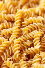 Close-up shot of a pile of cooked pasta in a bowl
