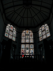Paintings on stained glass on the walls of Lawang Sewu