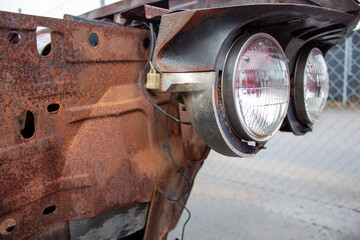Part of a rusty car.