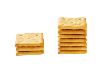 Stack of square crackers isolated on white background. Crackers placed on top of each other on a white background.